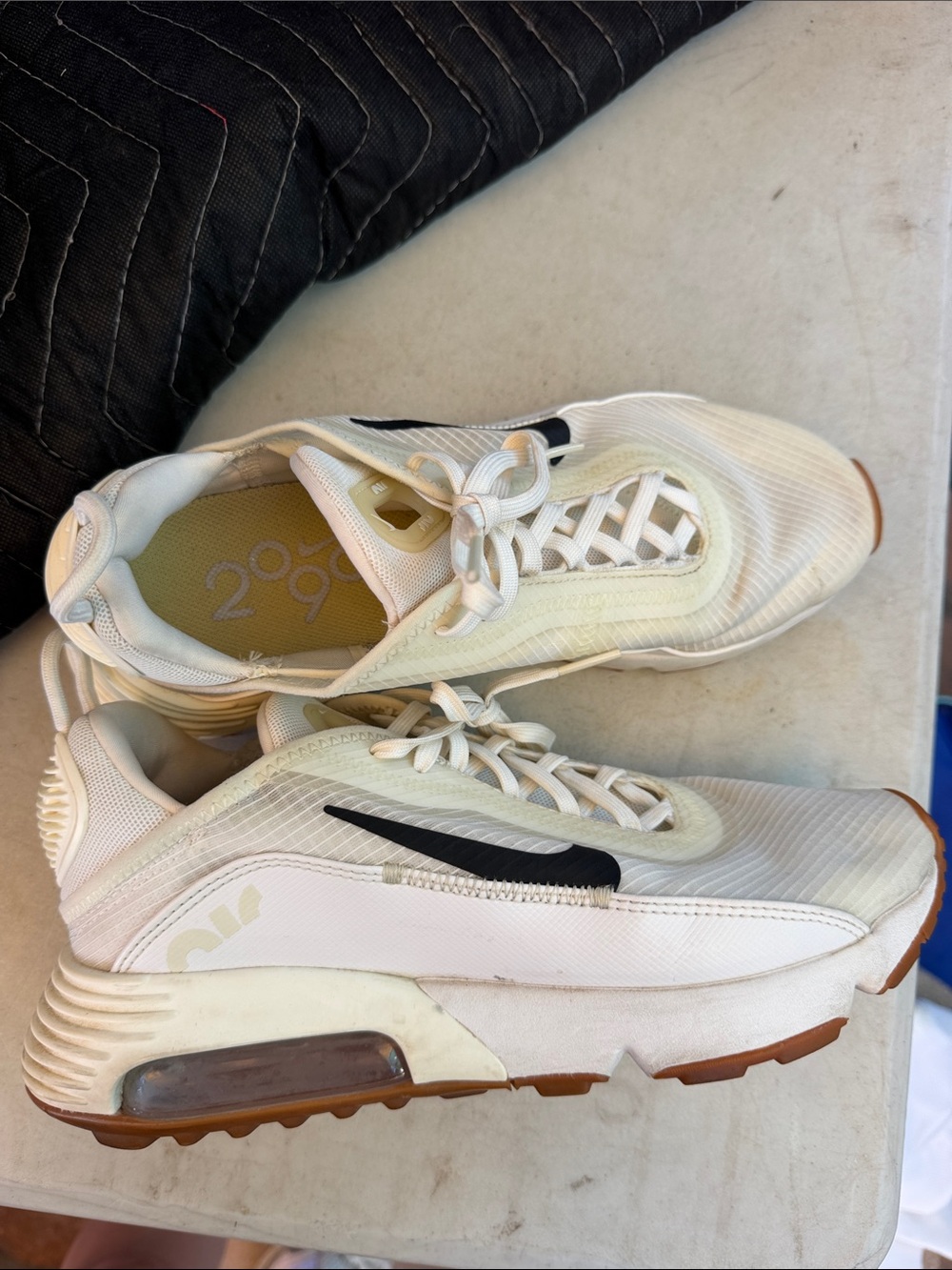 Nike Cream White Sneakers with Black Swoosh
